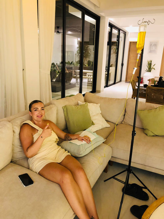 Client receiving IV drip at luxury villa in Seminyak Bali