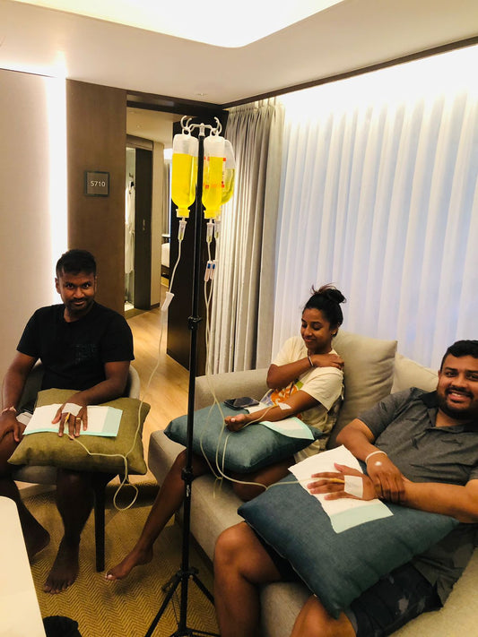 Client receiving IV drip at luxury resort in Nusa Dua Bali